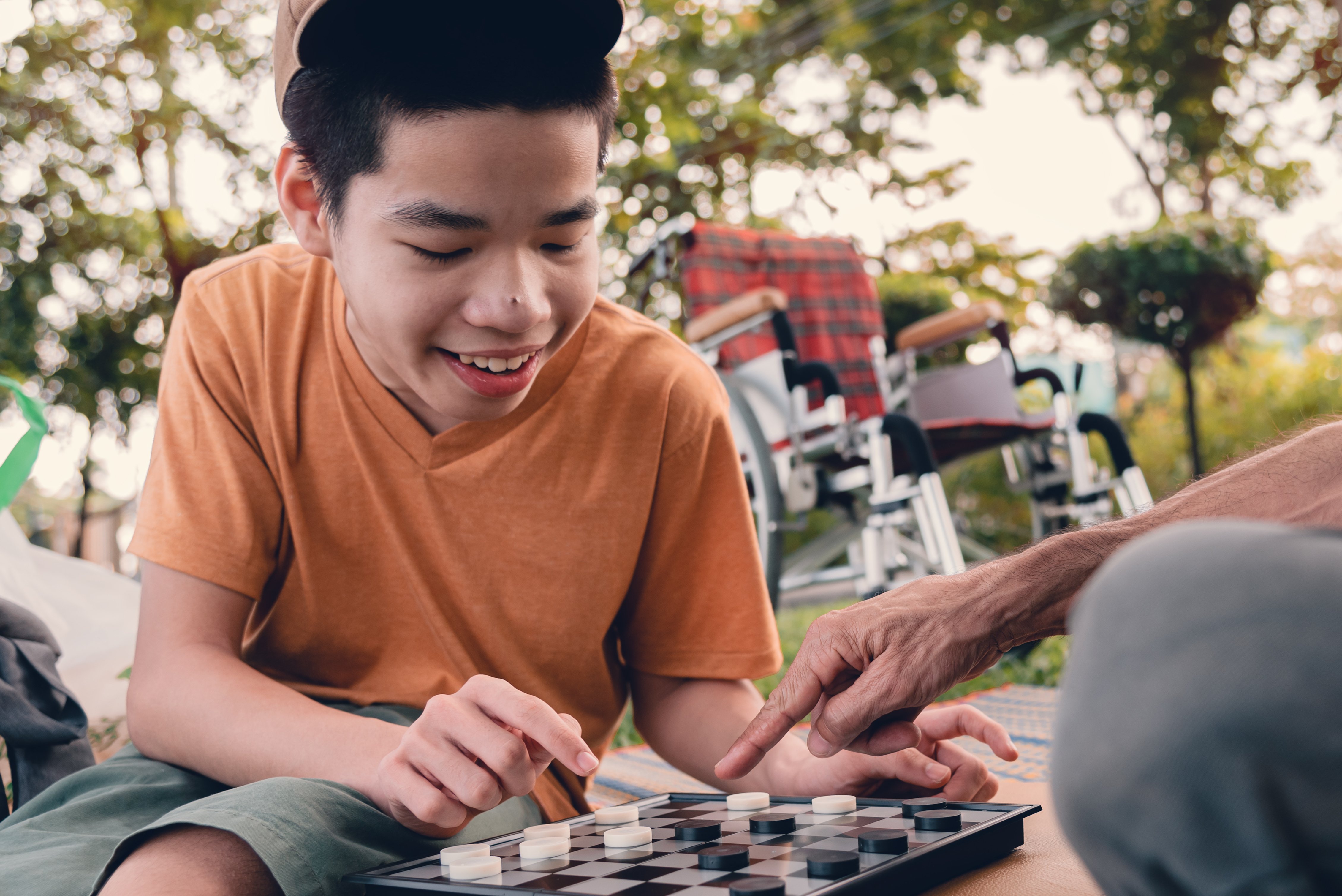 Young boy playing chess